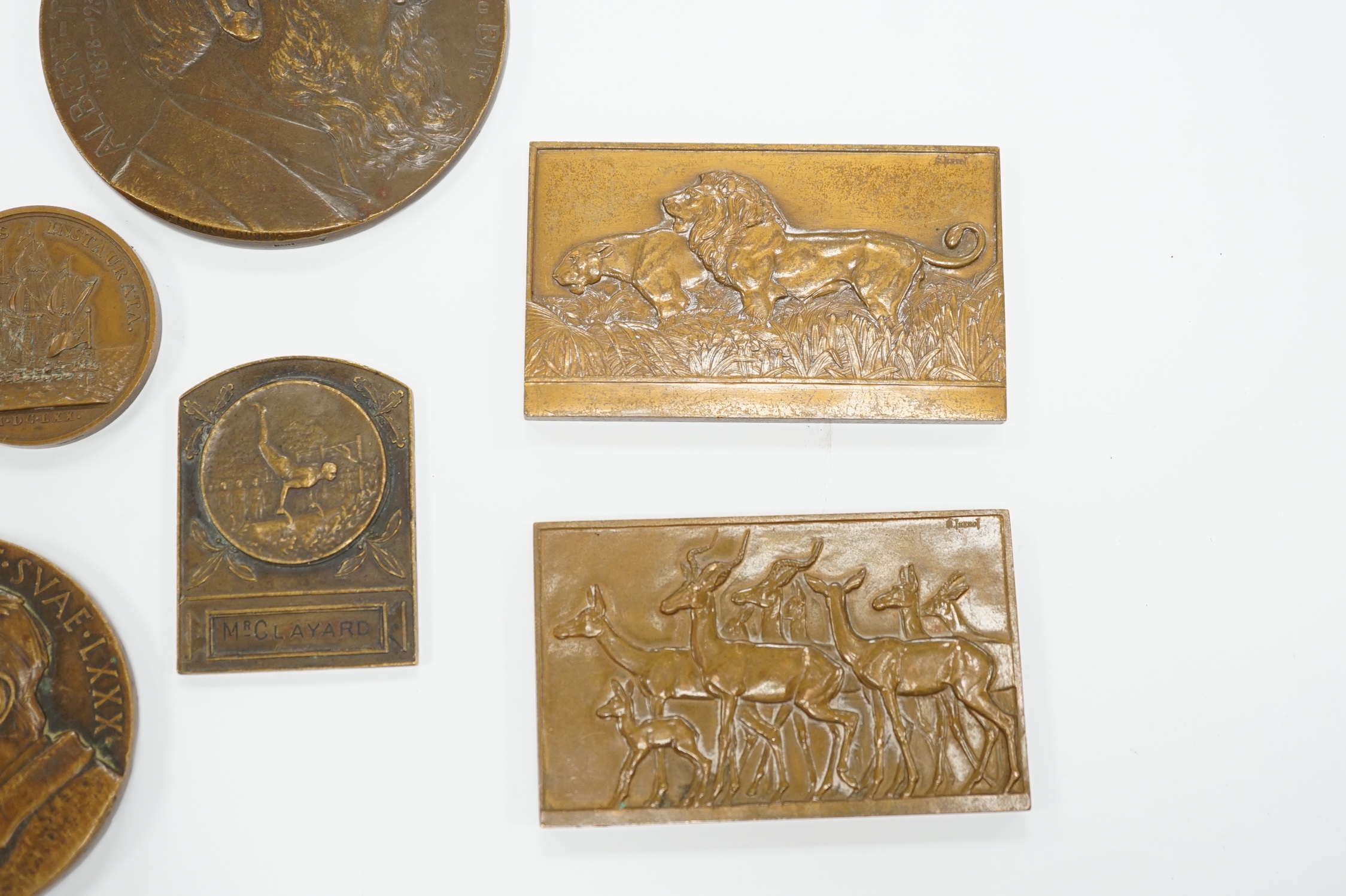Seven bronze medallions, including awards and commemorative pieces; A.H. Johnson, Henri Cangardel, Albert Thomas, etc., largest 8 cm diameter